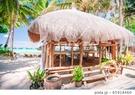 Massage exotic pavilion on the tropical beach 65918460