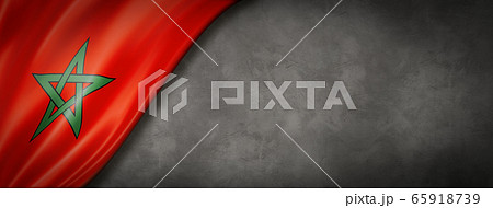Moroccan flag on concrete wall banner 65918739