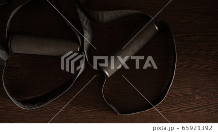 Closeup view of suspension training at home Closeup view of suspension training at home 65921392