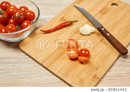 still life with cherry tomatoes, chili pepper and still life with cherry tomatoes, chili pepper and 65921433