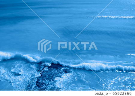 Seascape from above in the trendy classic blue color of the year. Seascape from above in the trendy classic blue color of the year. 65922366