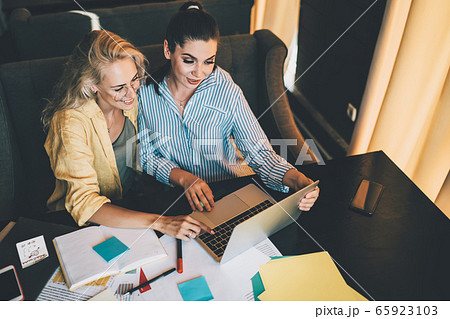 Successful woman creating startup with in working place Successful woman creating startup with in working place 65923103