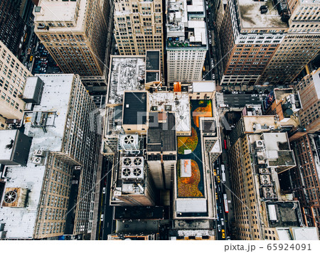 Roofs with air conditioning systems machinery, Cityscape metropolis, densely populated city with infrastructure Roofs with air conditioning systems machinery, Cityscape metropolis, densely populated city with infrastructure 65924091