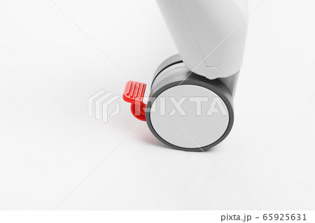 high chair plastic wheel with brake, close-up view 65925631