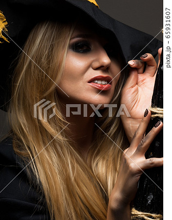 portrait of a girl witch on halloween portrait of a girl witch on halloween 65931607