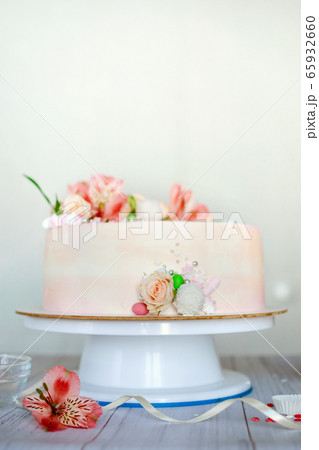 Delicate pink wedding cake with natural fresh Delicate pink wedding cake with natural fresh 65932660