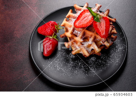 Delicious fresh baked belgian waffles with berries 65934603