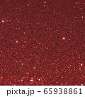 Red glitter background. 65938861