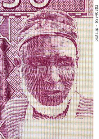 Old man a portrait from old Guinean money 65940882