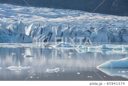 blue icebergs and lagoon 65941374