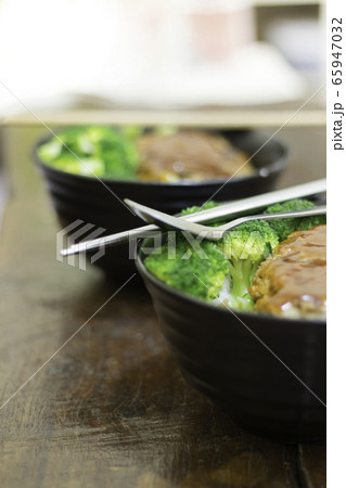 Pork burger rice with homemade broccoli for lunch 65947032