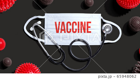 Vaccine theme with mask and stethoscope 65948062