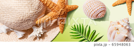 Summer concept with a straw hat and starfish 65948063
