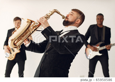 Music band in the studio with many instruments 65950586