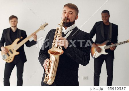 Music band in the studio with many instruments 65950587