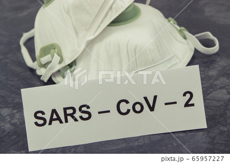 Inscription Sars-CoV-2 and protective mask N95. Inscription Sars-CoV-2 and protective mask N95. 65957227