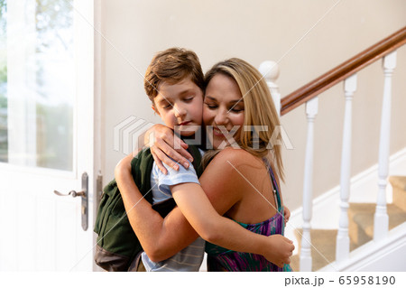 Caucasian woman and his son at home 65958190