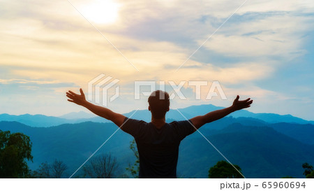 Man feeling fresh when staying at a mountain. Man feeling fresh when staying at a mountain. 65960694