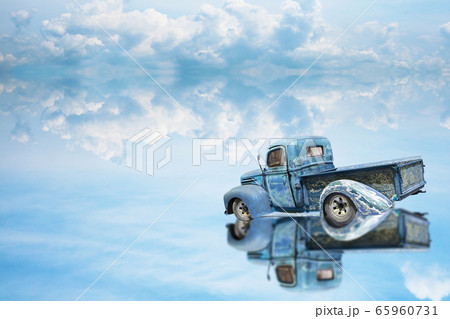 reflection car was parking on water on of lake and reflection car was parking on water on of lake and 65960731