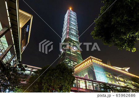 night view of the Xinyi District and Taipei 101 skyscraper in Taipei, Taiwan. The district is a prime shopping area in Taipei, anchored by a number of department stores and malls. night view of the Xinyi District and Taipei 101 skyscraper in Taipei, Taiwan. The district is a prime shopping area in Taipei, anchored by a number of department stores and malls. 65962686