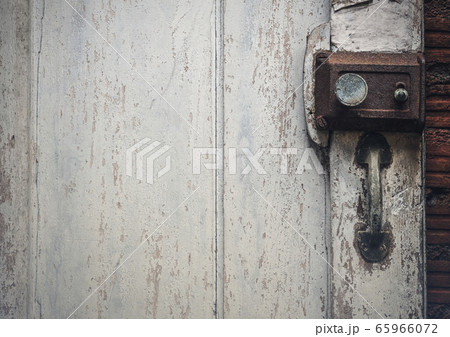 Old rusty door lock on wooden antique door Old rusty door lock on wooden antique door 65966072