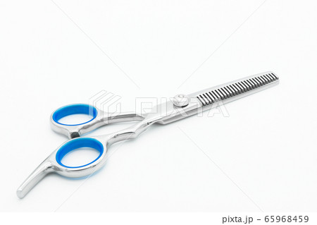 Close-up view of the teeth blade scissor isolated on white background. 65968459