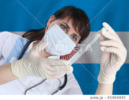 Scientist woman with test tube virus  65969895