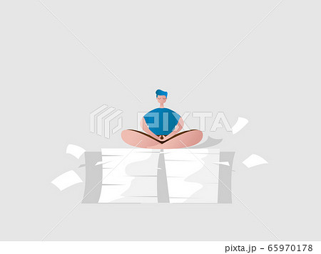 man relax sitting in meditation pose on a pile of 65970178