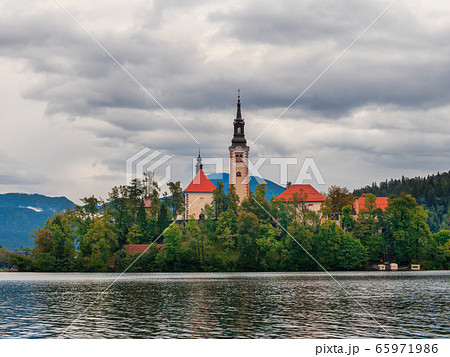 Bled island landscape with Pilgrimage Church of the Assumption of Maria on Bled lake Bled island landscape with Pilgrimage Church of the Assumption of Maria on Bled lake 65971986