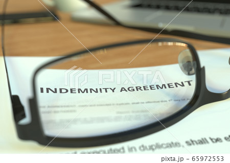 Indemnity agreement behind glasses on a desk, 3D rendering 65972553