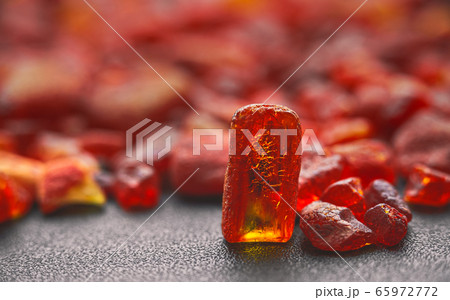 Amber stones natural background pattern Amber stones natural background pattern 65972772