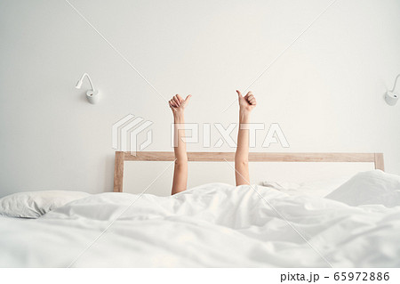 Female hands showing a gesture of approval 65972886