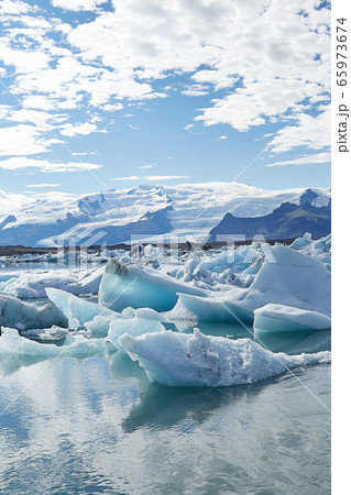 Amazing view of white icebergs and ice floes in Jokulsarlon glacier lagoon. Travel destination. Natural wonder. Beautiful Icelandic landscape Amazing view of white icebergs and ice floes in Jokulsarlon glacier lagoon. Travel destination. Natural wonder. Beautiful Icelandic landscape 65973674