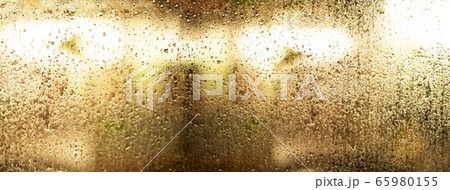 surface of wet gold metal with drop of water 65980155