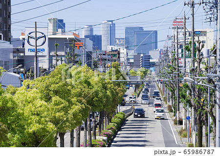 愛知県名古屋市北区本通 愛知県道102号線 名古屋犬山線 と名古屋駅前高層ビル群 愛知県名古屋市北区本通 愛知県道102号線 名古屋犬山線 と名古屋駅前高層ビル群 65986787