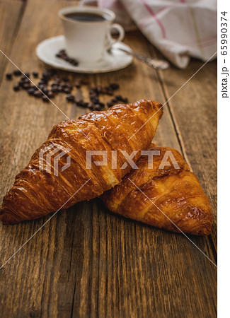 Croissant and coffee 65990374