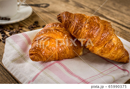 Croissant and coffee Croissant and coffee 65990375