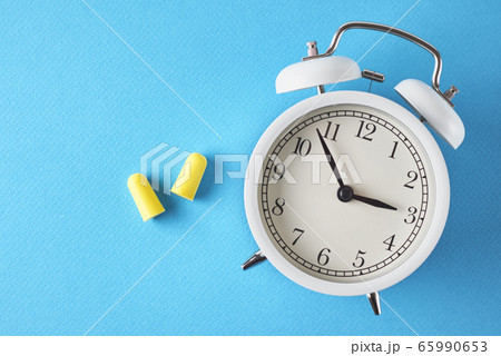 Insomnia problem concept. Alarm clock and ear 65990653