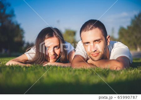Young couple in love in nature Young couple in love in nature 65990787