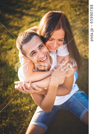 Young couple in love in nature Young couple in love in nature 65990788