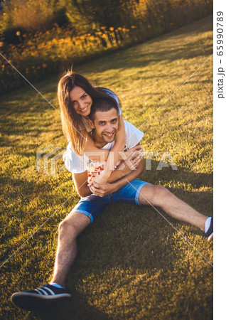 Young couple in love in nature Young couple in love in nature 65990789
