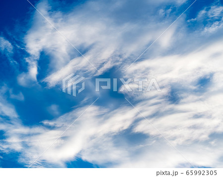 White clouds against blue sky background White clouds against blue sky background 65992305