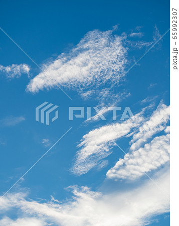 White clouds against blue sky background White clouds against blue sky background 65992307