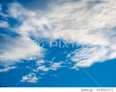 White clouds against blue sky background White clouds against blue sky background 65992311