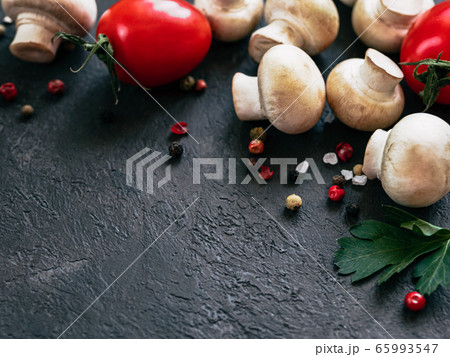 Food ingredients on black background, copy space 65993547
