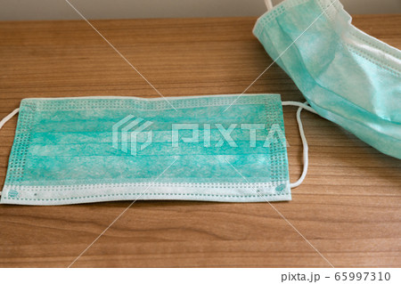 Medical concept, Medical protective mask on wooden 65997310