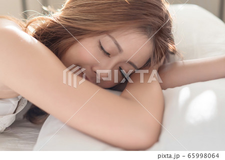 Portrait of beautiful Asian woman with attractive Portrait of beautiful Asian woman with attractive 65998064