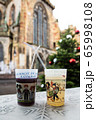 Two christmas glasses with mulled wine . 65998108