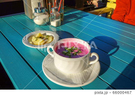 Cold beetroot soup with sour cream, greens and hot Cold beetroot soup with sour cream, greens and hot 66000467