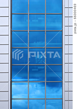 Facade of modern building. Reflection of blue sky Facade of modern building. Reflection of blue sky 66000469